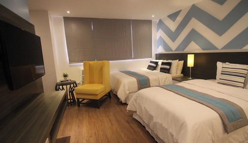 Habitación triple Deluxe