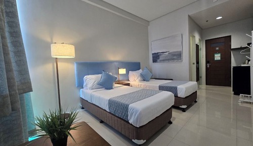 Habitación con 2 camas individuales, vistas a la ciudad