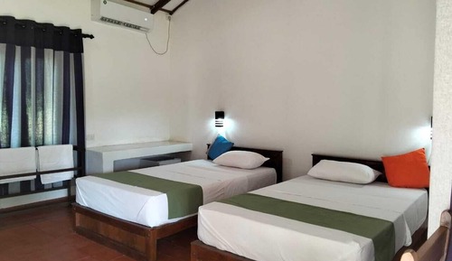 Habitación triple Confort, vistas al jardín