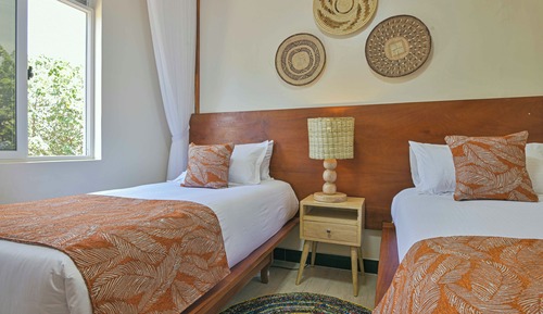 Habitación junior con 1 cama doble o 2 individuales
