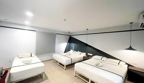 Habitación familiar, varias camas