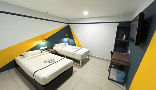 Habitación con 2 camas individuales
