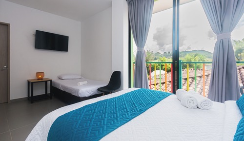 Habitación triple Deluxe, vistas al jardín