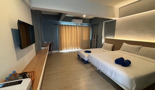 Habitación triple Deluxe