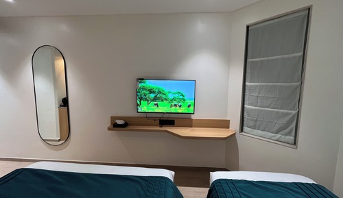 Habitación triple Deluxe