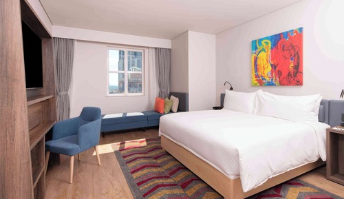 Habitación Deluxe, 1 cama de matrimonio grande con sofá cama