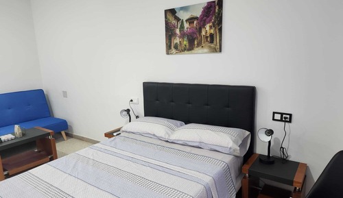Habitación familiar con 1 cama doble o 2 individuales, vistas a la ciudad