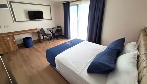 Habitación individual, vistas parciales al mar