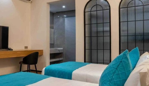 Habitación Deluxe con 1 cama doble o 2 individuales