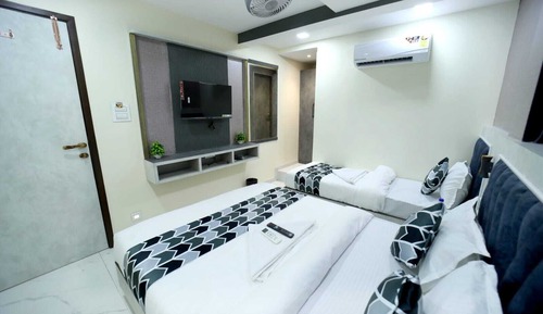 Habitación triple Deluxe, vistas a la ciudad