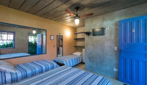 Habitación cuádruple Confort, vistas al jardín