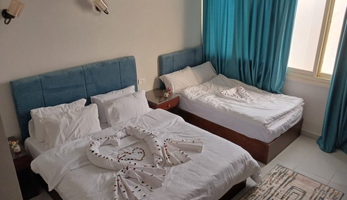 Habitación triple Deluxe