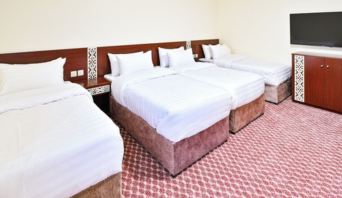 Habitación cuádruple Deluxe