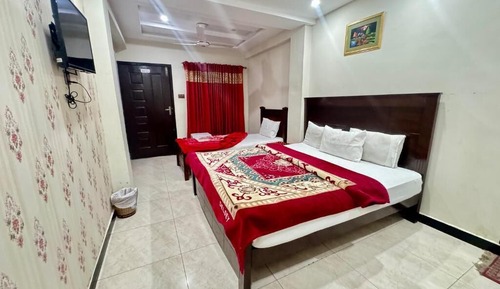 Habitación triple Deluxe