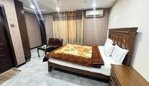 Habitación Deluxe con 1 cama doble o 2 individuales