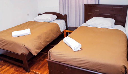 Habitación Confort con 1 cama doble o 2 individuales