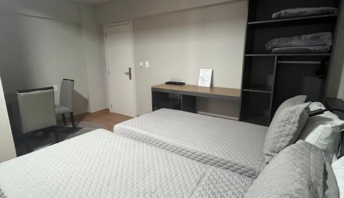 Habitación cuádruple Deluxe, vistas a la ciudad