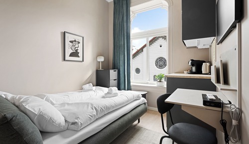 Habitación con 1 cama doble o 2 individuales, vistas a la ciudad