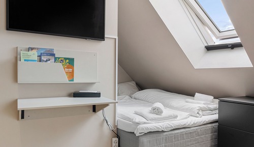 Habitación, varias camas