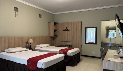 Habitación ejecutiva con 2 camas individuales, vistas al jardín