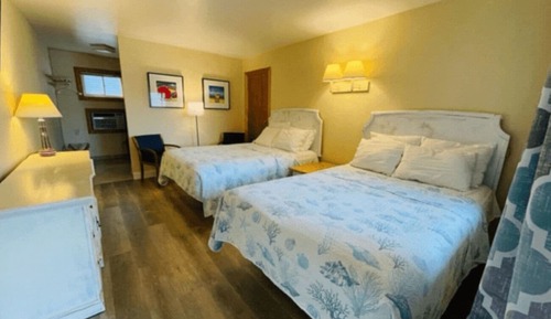 Habitación, varias camas