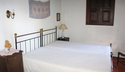 Habitación estándar con 1 cama doble o 2 individuales, patio, vistas al jardín