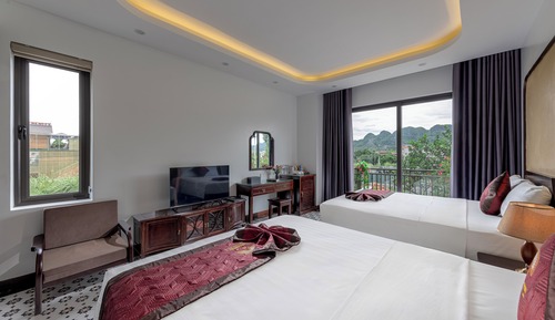 Habitación cuádruple ejecutiva, balcón