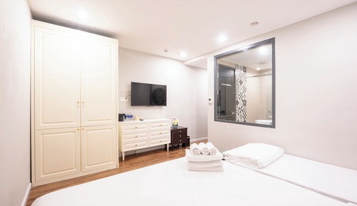 Habitación triple Deluxe (No Windows)