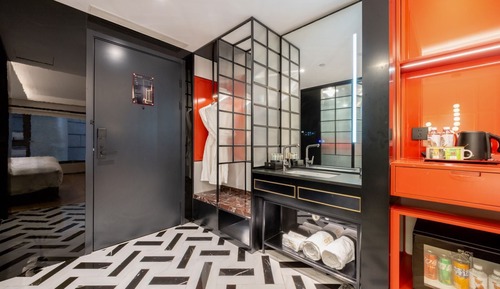 Habitación Elite con 1 cama doble o 2 individuales