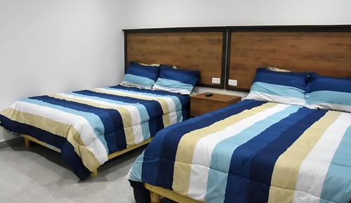 Estudio familiar, 2 camas de matrimonio