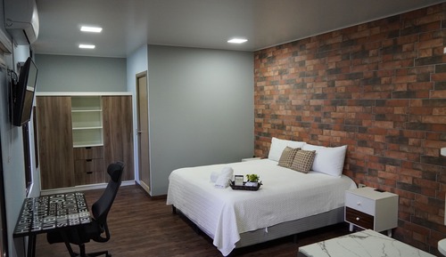 Suite estudio Deluxe, 1 cama de matrimonio grande, vistas al jardín
