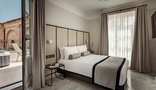 Suite superior, patio, vistas a la ciudad