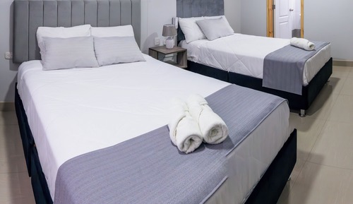 Habitación Confort con 1 cama doble o 2 individuales