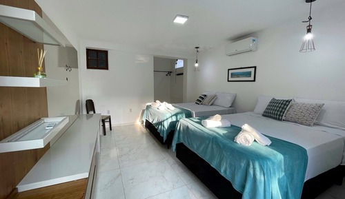 Habitación cuádruple Confort, vistas a la piscina