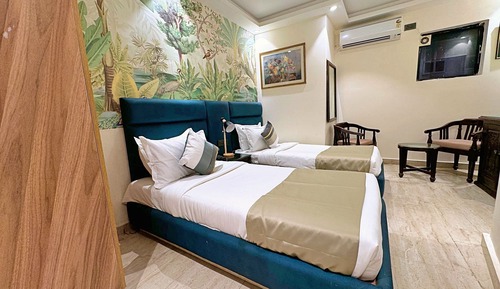 Habitación Deluxe con 1 cama doble o 2 individuales, sin ventanas