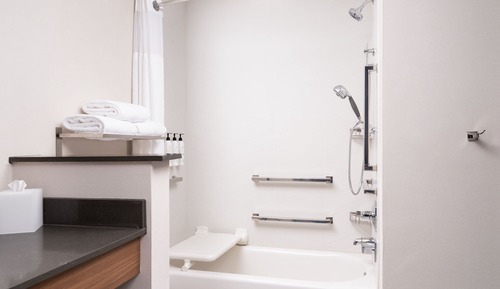 Suite, 1 cama de matrimonio grande con sofá cama (Mobility/Hearing Accessible, Tub)