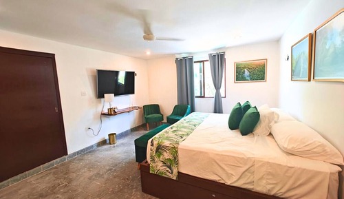 Habitación de diseño, varias camas, baño privado