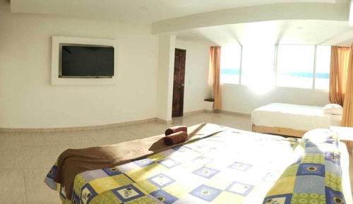 Habitación Premium, varias camas