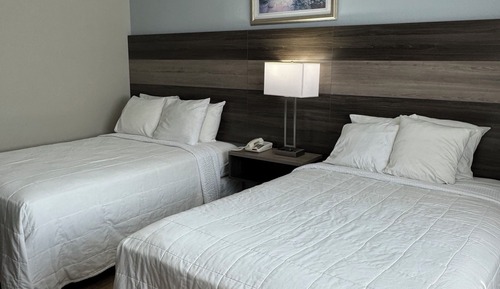 Habitación estándar con 1 cama doble o 2 individuales, balcón