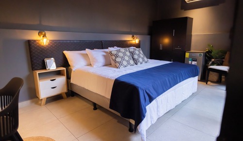 Suite estudio superior, vistas al jardín