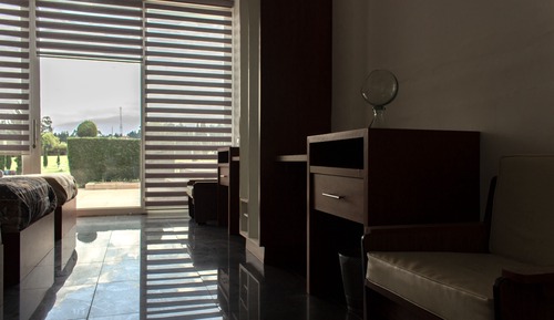 Habitación cuádruple Confort, vistas al jardín