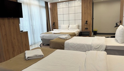 Habitación cuádruple Deluxe, vistas a la ciudad