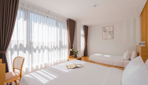 Habitación triple, vistas a la ciudad