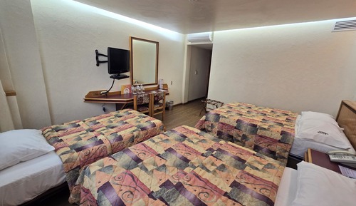 Habitación triple Confort, varias camas