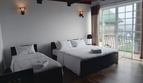 Habitación cuádruple Deluxe