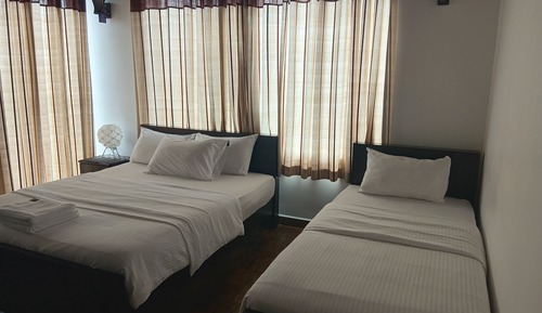 Habitación triple Deluxe