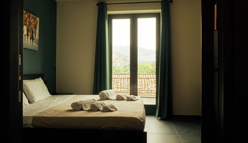 Habitación Business doble, 1 cama de matrimonio con sofá cama, vistas a la ciudad