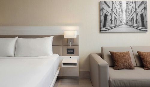 Habitación Deluxe, 1 cama de matrimonio grande con sofá cama, vistas a la ciudad