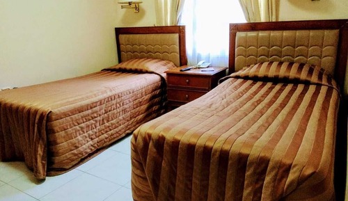Habitación superior con 1 cama doble o 2 individuales