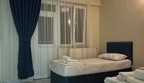 Habitación clásica con 2 camas individuales